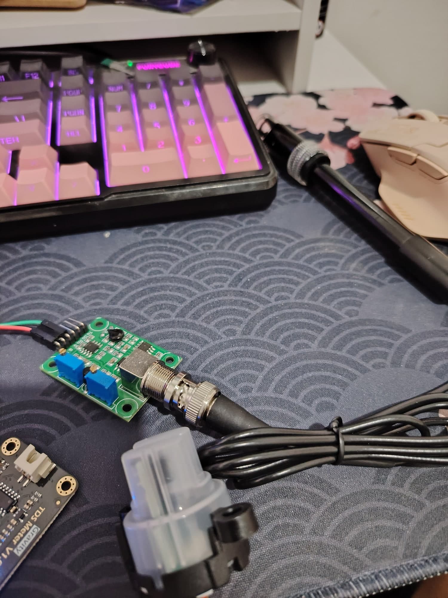 The pH signal-conditioning board with its BNC probe connected, next to the Gravity TDS meter board.